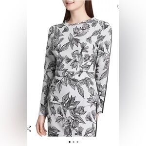 Asymmetric Peplum Top